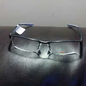 NIKE gun metal frames.